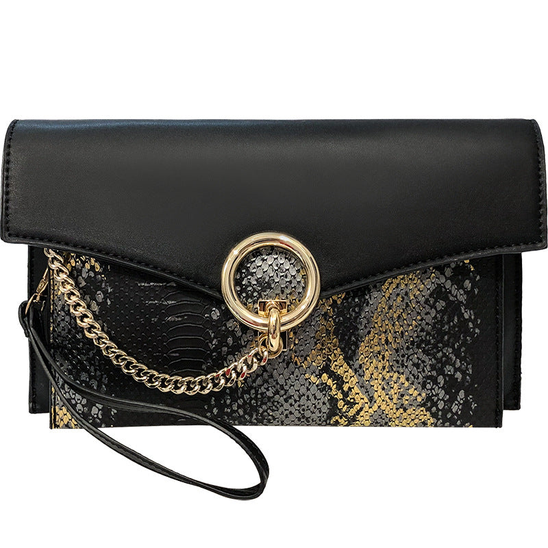 snake pattern clutch Bag