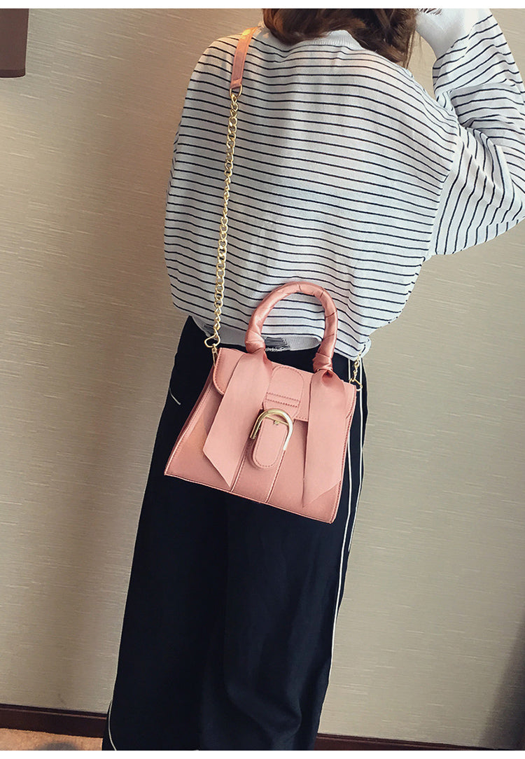 Bow shoulder cross body bag